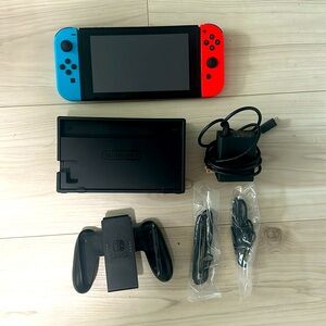Nintendo Switch with Wristbands, controller, dock station and charger